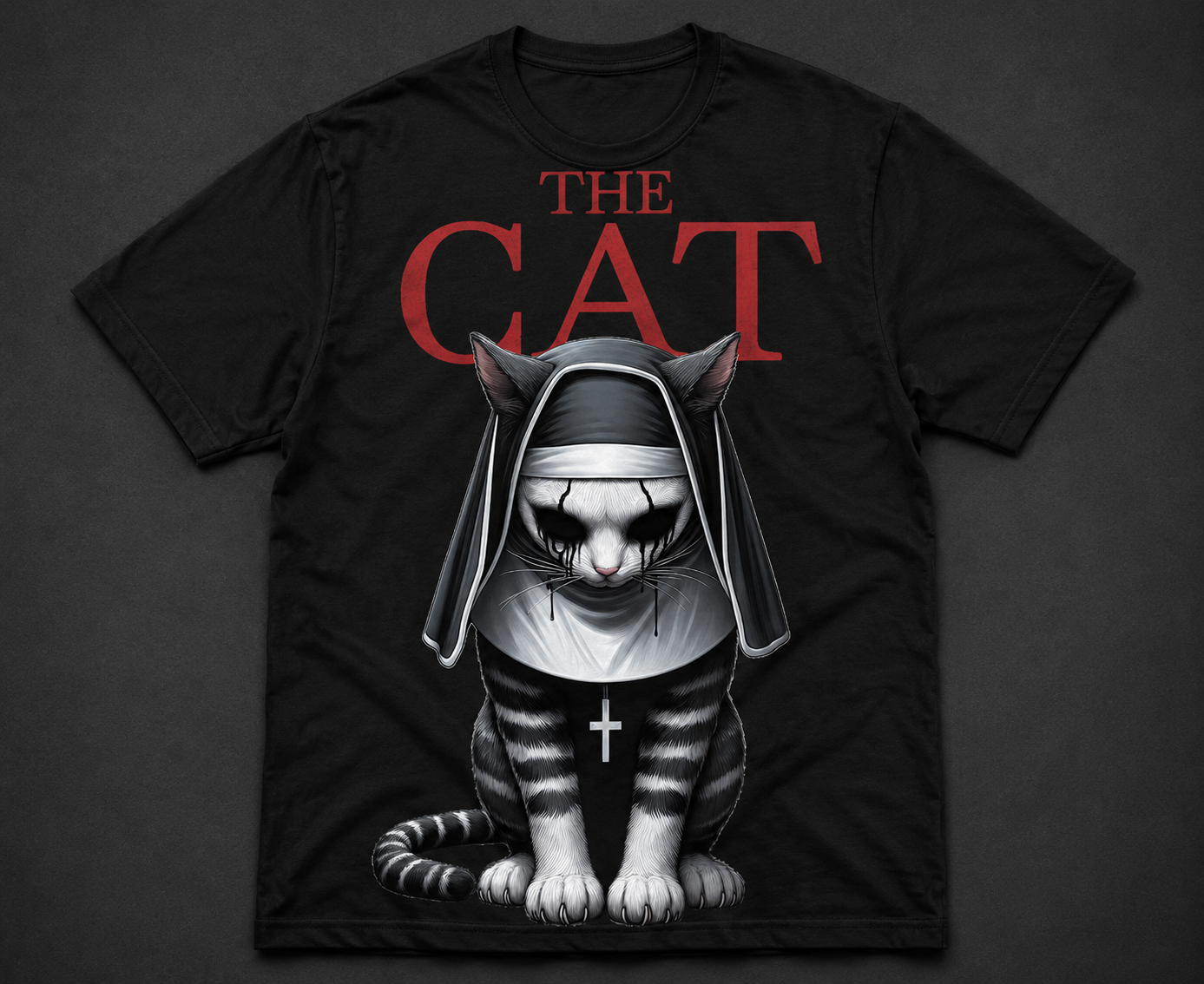 Black t-shirt with a graphic of a cat wearing bunny ears and the text 'THE CAT' on a dark background.
