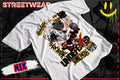 A white graphic t-shirt featuring a complex multicolor print with skulls, roses, and stylized text, displayed on a dark graphic background with 'STREETWEAR' and 'MIX' text overlays.